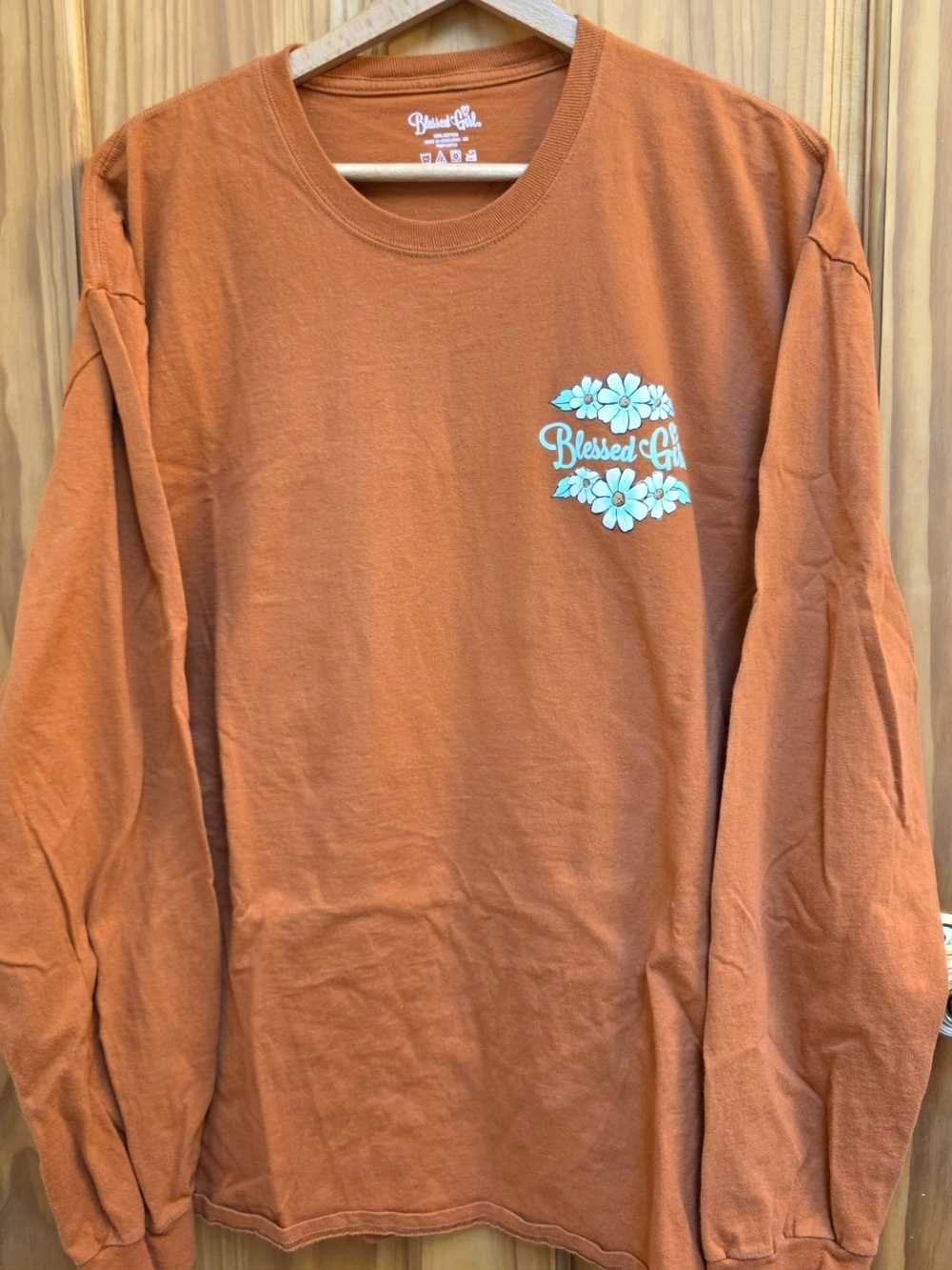 Blessed Girl Long Sleeve Tee in Rust Orange with Floral Chest Graphic